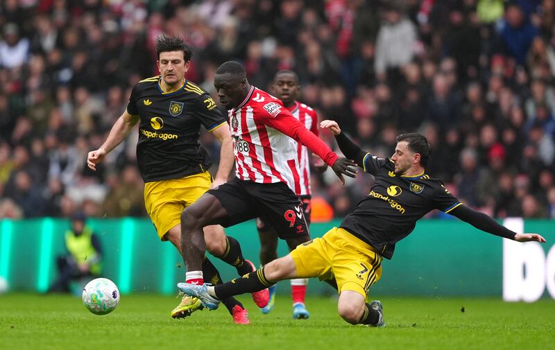Sunderland's Brian Brobbey in action against Manchester United's Mason Mount and Harry Maguire. Photograph: Owen Humphreys/PA