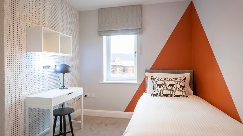 Bedroom in four-bed end-terrace home.