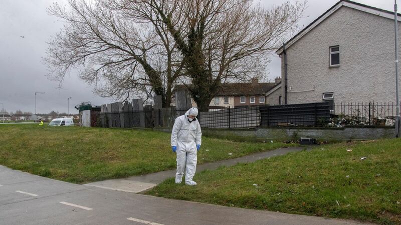 Gardaí at the scene on Wednesday morning at Shancastle Park, Clondalkin, where a man was shot and seriously injured. Photograph: Colin Keegan/Collins Dublin