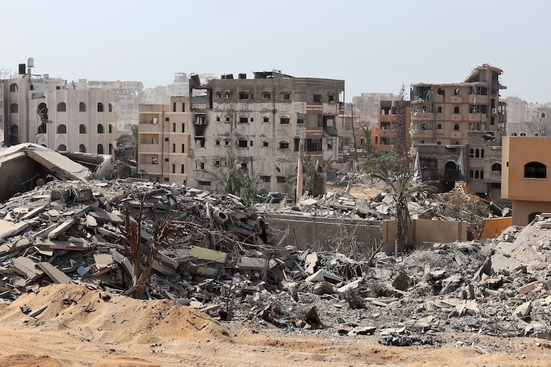 Destroyed buildings in Gaza city after Israeli air strikes. Photograph: Jack Guez/Pool/AP