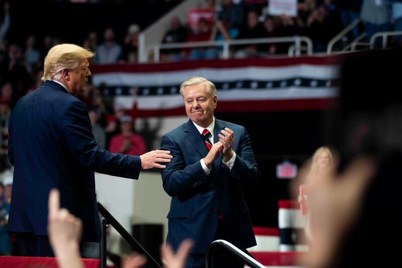 President Donald Trump with senator Lindsey Graham during a campaign rally in Charlotte, North Carolina, on March 2nd, 2020. Photograph: Doug Mills/The New York Times
                      