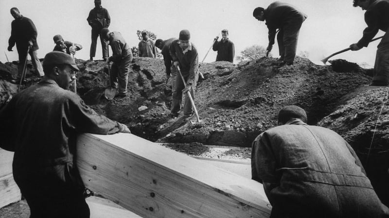 Prisoners bury homeless men on Hart Island who died in a methanol poisoning incident in New York's Bowery area in 1963. Photograph: Arthur Schatz/Getty
