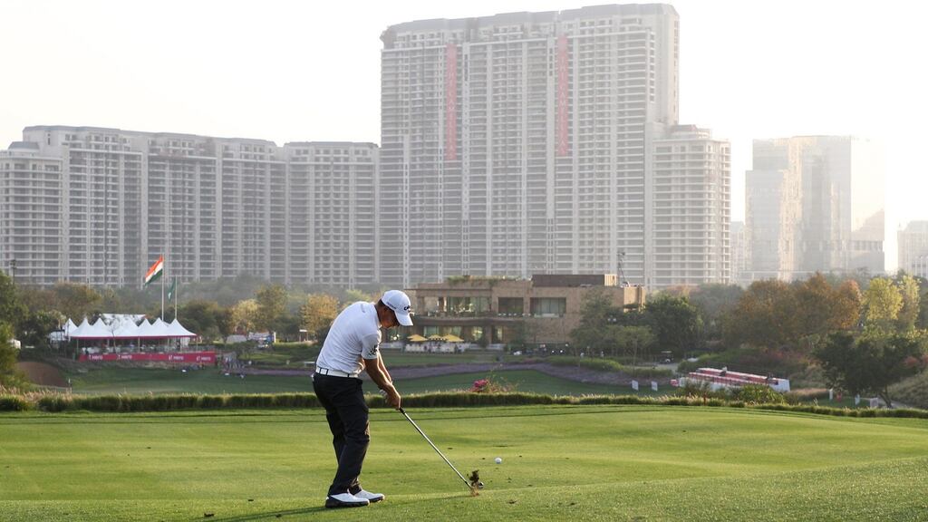 Argentina’s  Emiliano Grillo  plays his second shot on the 18th hole during day one of the Hero Indian Open at DLF Golf and Country Club  in  Delhi, India. Photograph: Matthew Lewis/Getty Images