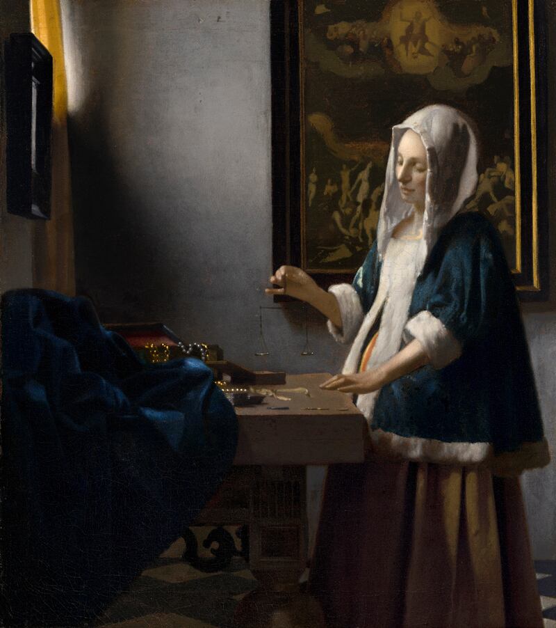 Woman Holding a Balance, Vermeer, c. 1662-64, oil on canvas.