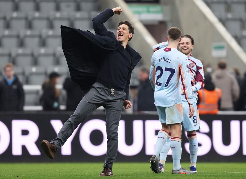 Keith Andrews celebrates Brentford's win at Newcastle. Photograph: George Wood/Getty Images