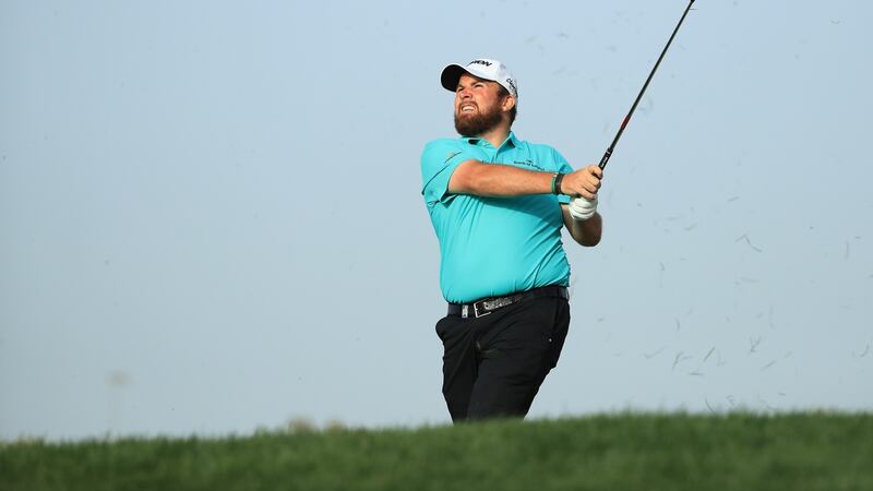Lowry plays his second shot on the 16th hole during day three of the Abu Dhabi HSBC Golf Championship at Abu Dhabi Golf Club. Photo: Andrew Redington/Getty Images