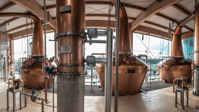 The distillery is a marble-floored structure, with floor-to-ceiling glass,  which showcases Italian-made bespoke copper pot stills.