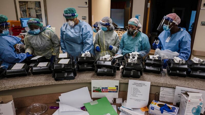 Medical staff  in the reception area for dinner in the serious infectious disease unit at a DHR Health hospital in Edinburg, Texas. Photograph: Lynsey Addario/New York Times