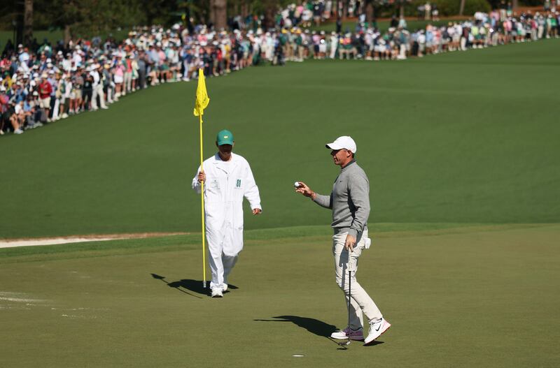 Rory McIlroy reacts after a birdie on the second green during the second round. Photograph:  Richard Heathcote/Getty Images