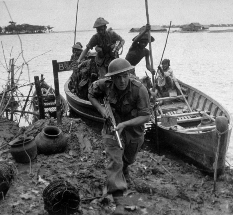 Members of the British forces in Burma prepare to search a village for Japanese soldiers in 1945. Photograph: Keystone/Getty Images``