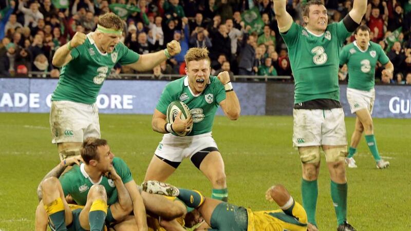 Ireland players celebrate victory against Australia in November. Photography: Inpho