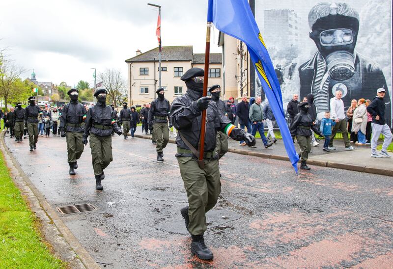 Masked members of a dissident republican colour party take part in a commemorative march in Derry on Monday. Photograph: Paul Faith/AFP via Getty Images