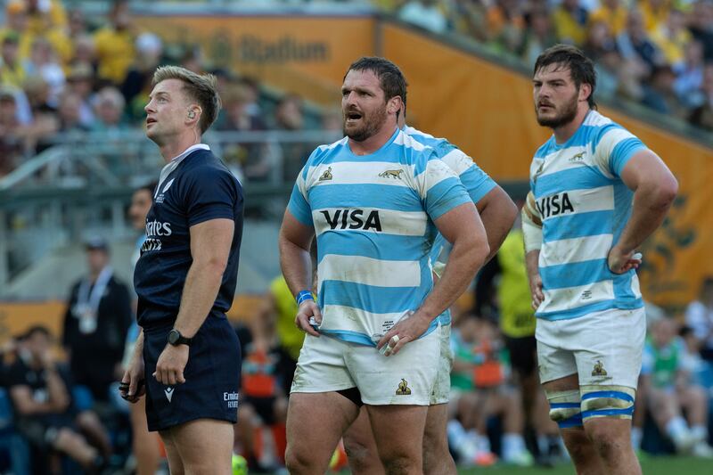 Pumas captain Julian Montoya (centre) and referee Christophe Ridley in Sydney's Allianz Stadium on Saturday. Photograph: Steve Christo/Corbis/Getty