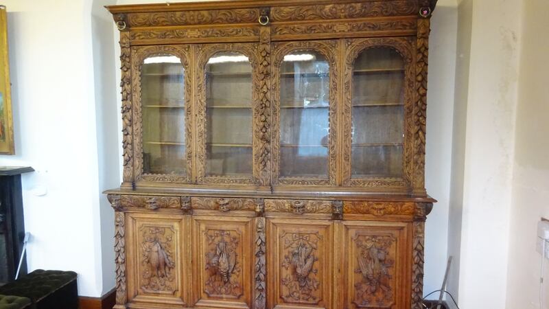 Heavily-carved oak bookcase, created for the Cork International Exhibition of 1902 (€1,000- €1,500 Lynes & Lynes)