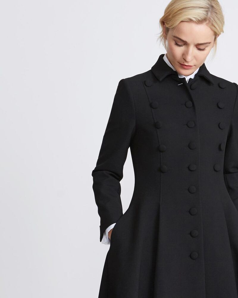 Peter O’Brien for Dunnes Stores: black military-style wool coat with three rows of buttons, €350