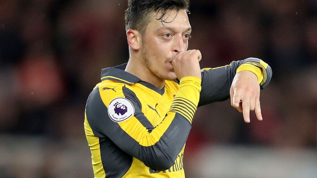 Arsenal’s Mesut Ozil celebrates scoring against Middlesbrough at the Riverside Stadium. Photograph: PA