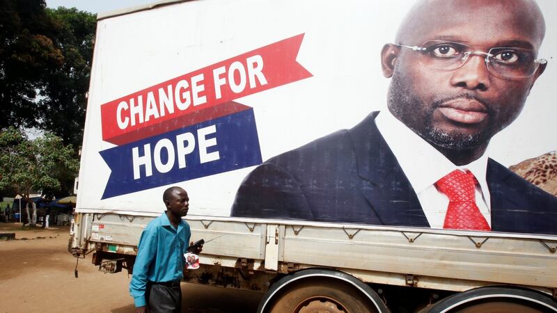 George Weah, presidential candidate of Coalition for Democratic Change, took just over 61% of the vote. Photograph: Reuters