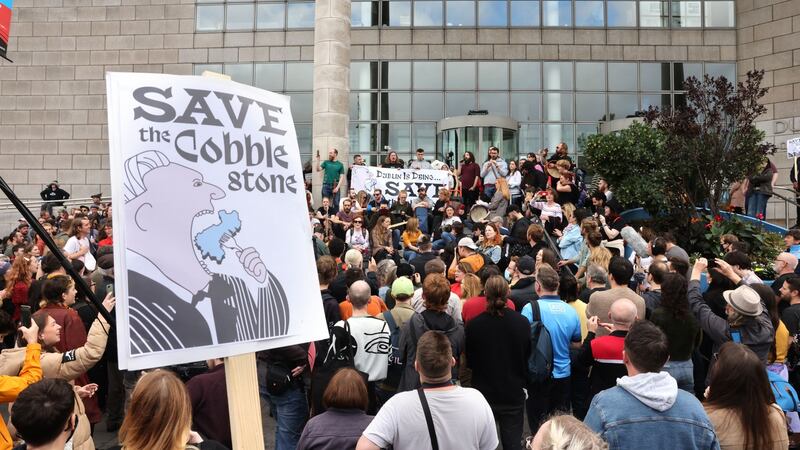 Protesters march to the Dublin City Council offices in protest at a proposal to build a 114-room hotel around the Cobblestone pub at Smithfield, Dublin. Photograph: Dara Mac Dónaill