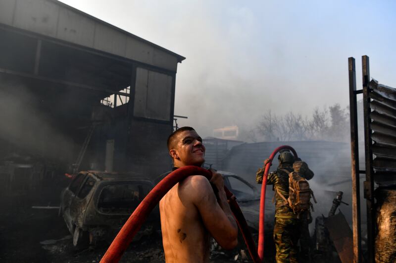 As hundreds of Greek firefighters attempted to tackle the blaze, other countries sent reinforcements. Photograph: Michael Varaklas/AP