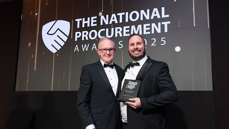 Michael O'Callaghan, awards judge, presents the sustainable procurement team of the year award to Seán McCaffrey, Iarnród Éireann.