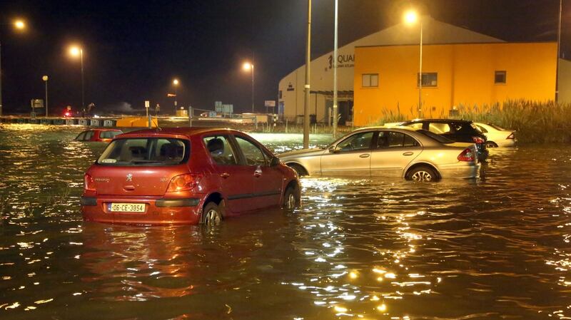 Cars in the flooded car park near the Galway Atlantaquaria in Salthill during Storm Eleanor. Photograph: Joe O’Shaughnessy