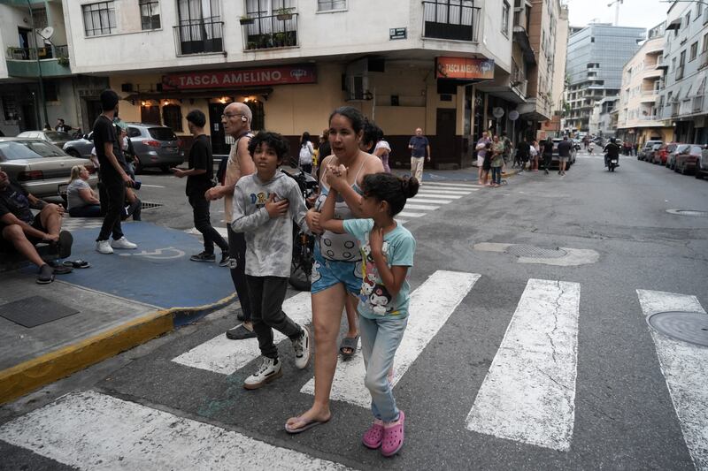 People  on the  streets following an earthquake in Caracas. Photograph:  Manaure Quintero/AFP via Getty Images)