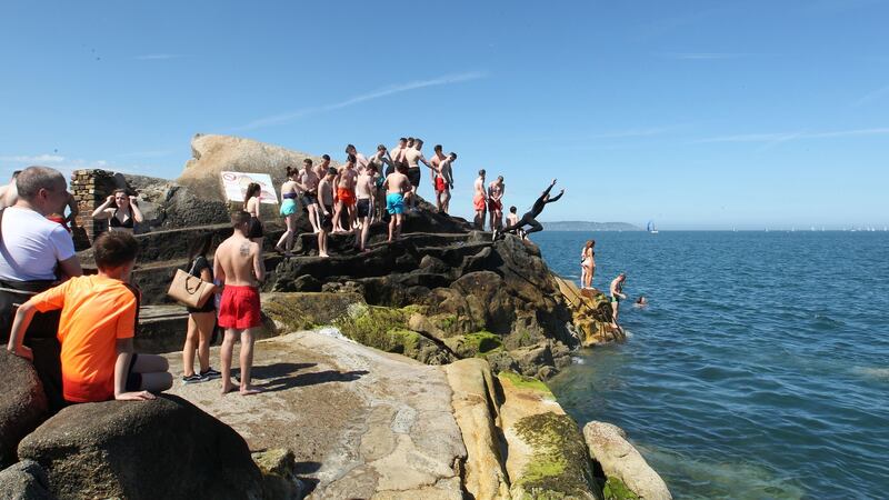 Enjoying the weather at the Forty Foot, Sandycove, Dublin. Photograph: Collins