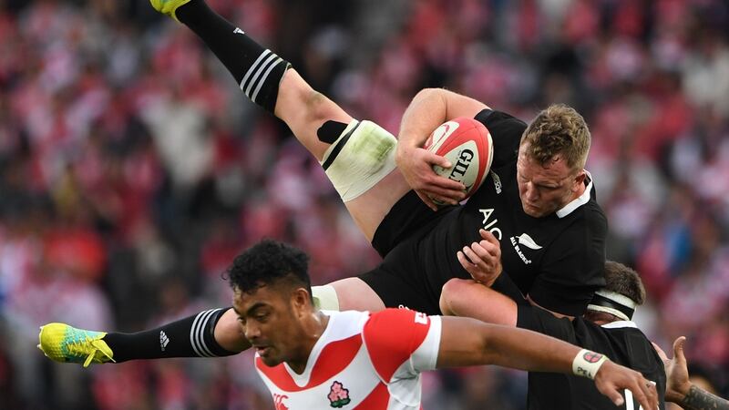 New Zealand’s  Gareth Evans  catches the ball during the Test  match against Japan in Tokyo. Photograph: Toshifumi Kitamura/AFP/Getty Images
