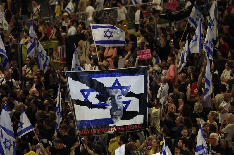 Thousands of demonstrators supporting the families of Israeli hostages held by Hamas in Gaza take part in a protest rally outside the Kyria military headquarters in Tel Aviv,  on Sunday. Photograph: Abir Sultan/EPA