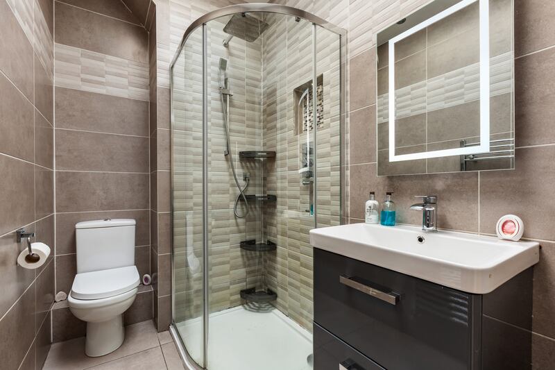 The bathroom has a glazed roof to maximise natural light