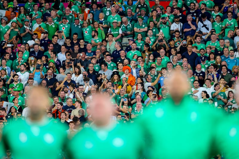 Ireland fans during the national anthems ahead of the 2023 World Cup Pool B game against Scotland at Stade de France. Photograph: Dan Sheridan/Inpho