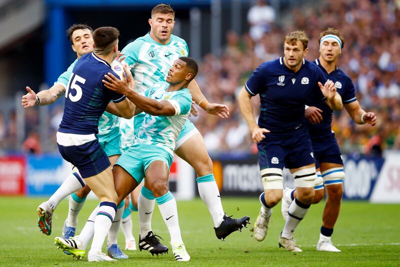 Damian Willemse of South Africa tackles Scotland's Blair Kinghorn. South Africa gave Scotland nothing easy, not a scrum, lineout or solitary ruck, where they contested or counter-rucked relentlessly. Photograph: Steve Haag/Steve Haag Sports/Inpho 