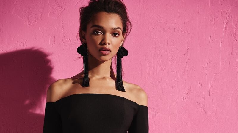 Black dress €55,  earrings €24, River Island.