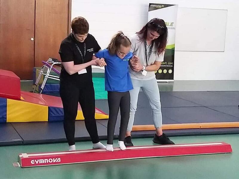 Clare Sheehan, head coach Cork Acro, Scarlett, and Aimi Baker, Gymnastics Ireland.