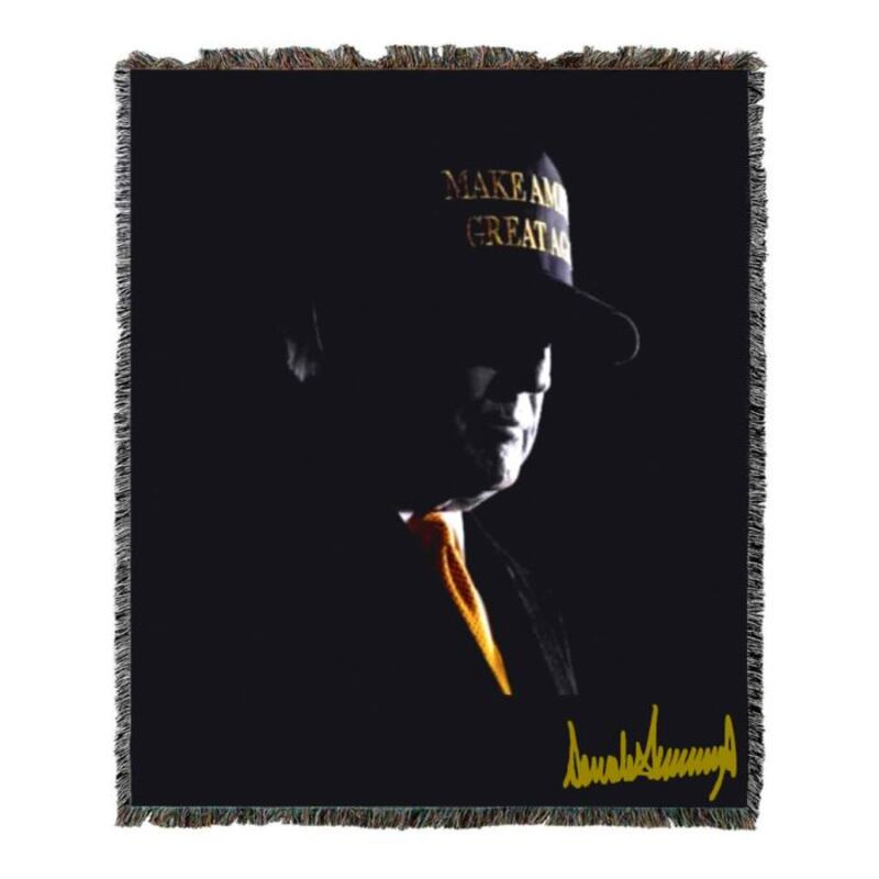 A 45th & 47th president woven blanket from  Trump Store, $200