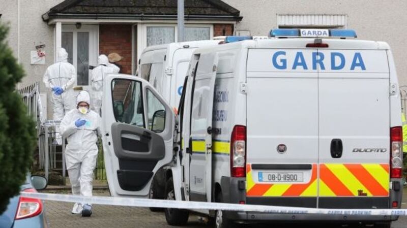 Forensic officers at a house in   Limerick where the body of the  11-year-old boy was discovered last Sunday evening. Photograph: Niall Carson/PA