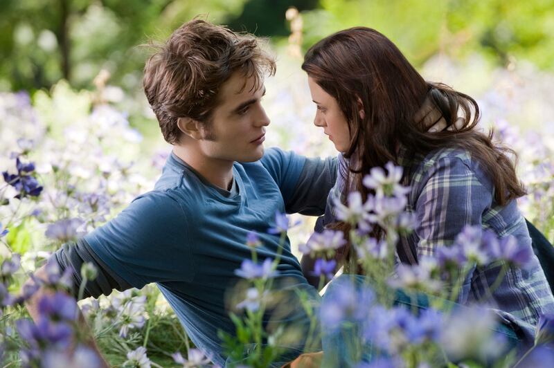 Kristen Stewart as Bella Swan and Robert Pattison as Edward Cullen in the Twilight film series.