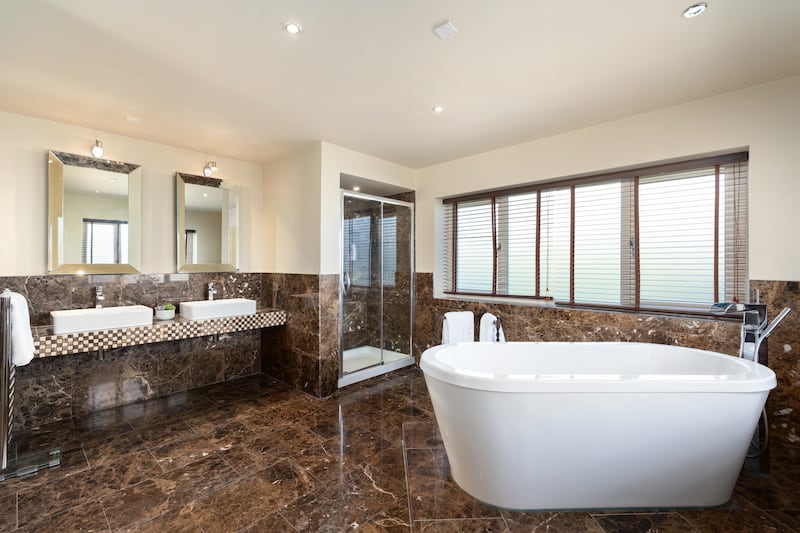 The house has five bathrooms