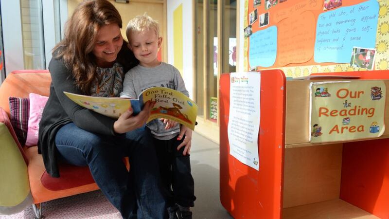 Sylwia Schonfeld and her son, Jakub (4), from Fairview, Dublin, reading as part of Chatter Matters at the Larkin Childcare Facility, Ballybough Preschool, Ballybough, Dublin. Photograph: Dara Mac Dónaill
