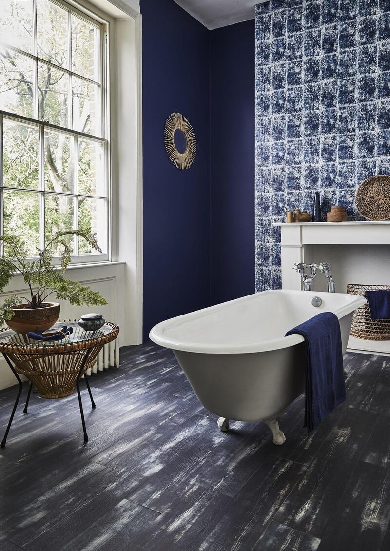 luxury vinyl tile is ideal for wet spaces and each of its “planks” clicks together to give a seamless finish.