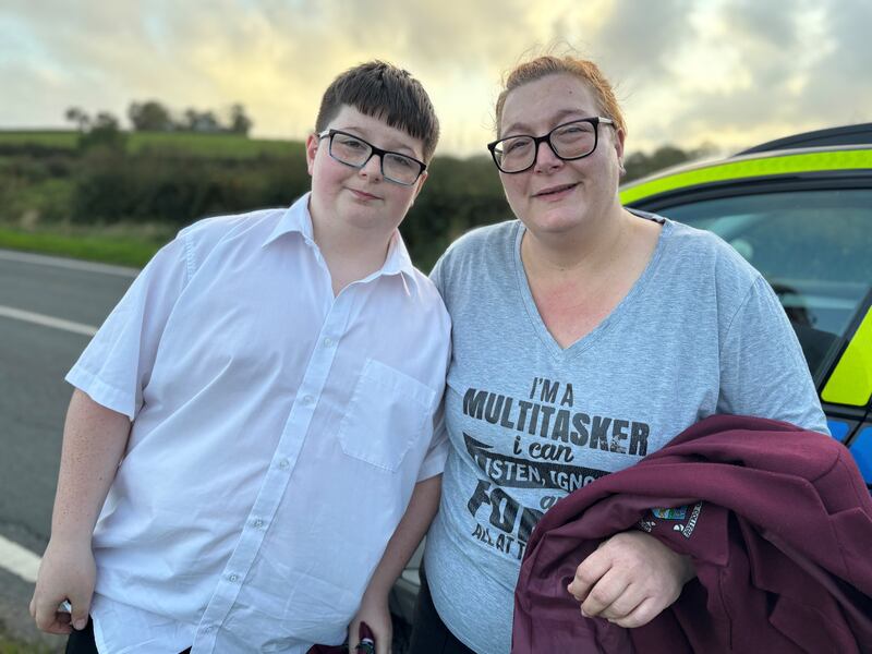 Dylan Lee (12), who was a passenger on the bus, and his mother Stacey. Photograph: Rebecca Black/PA Wire

