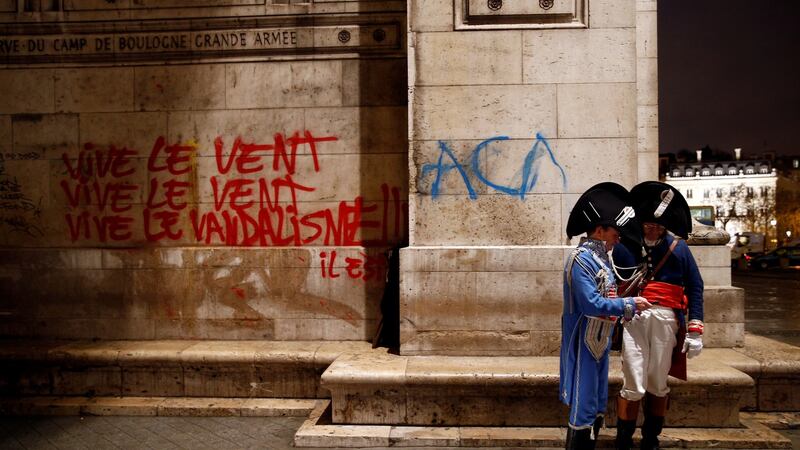 Graffiti  on a  wall at the Arc de Triomphe in Paris on the day after serious clashes with yellow vest protesters. Photograph: Stephane Mahe/Reuters