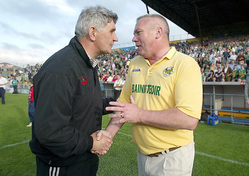 Managers Mick O'Dwyer and Páidí Ó Sé when managing Kildare and Kerry respectively in 2002. Photograph: Morgan Treacy/Inpho