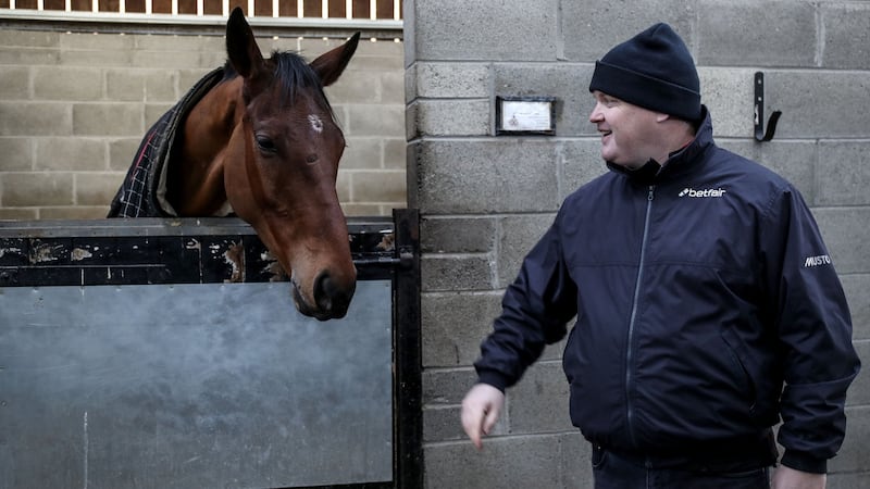 Gordon Elliott with Envoi Allen at his yard in Longwood, Co Meath, on Monday. Photograph: Dan Sheridan/Inpho