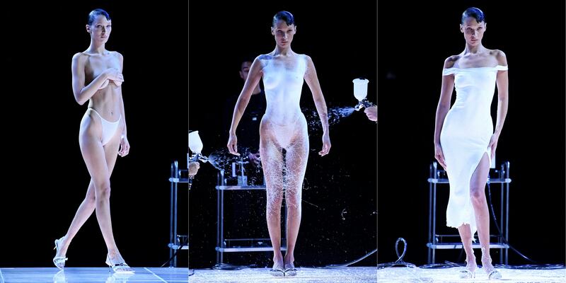 Coperni: Bella Hadid has her Fabrican outfit applied. Photograph: Julien de Rosa/AFP via Getty