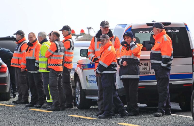 Members of the Civil Defenvce and Coastguard involved in the search for Rescue 116 at Blacksod, Co Mayo. Photograph: Collins