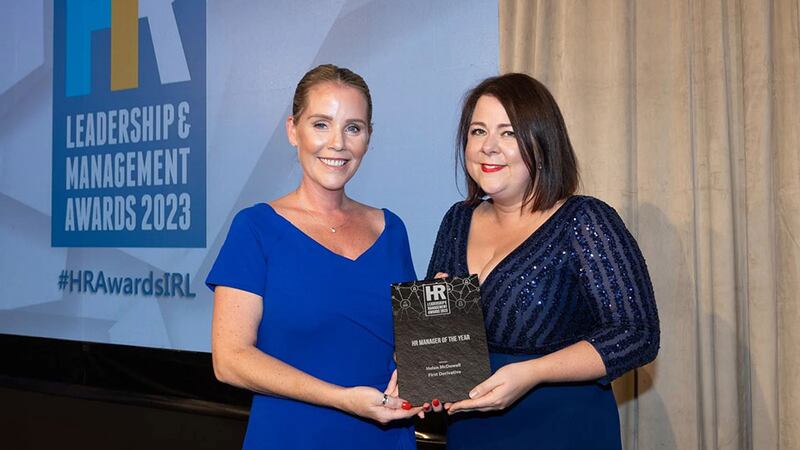 Jennifer Maher, director of hospitality recruitment, Excel Recruitment, presents the HR manager of the year award to Helen McDowell, First Derivative