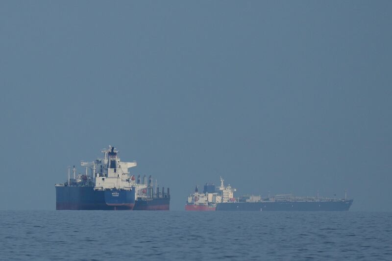 Oil tankers and cargo ships line up in the Strait of Hormuz, a key shipping strait. Photograph: Altaf Qadri for AP