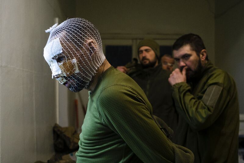 A wounded Ukrainian soldier at a stabilisation point near the frontline city of Pokrovsk, Donetsk region. Photograph: Sergey Shestak/EPA