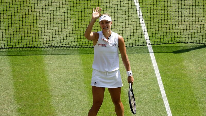 Kerber waves to the crowd after winning her semi-final. Photo: Ben Curtis/PA Wire
